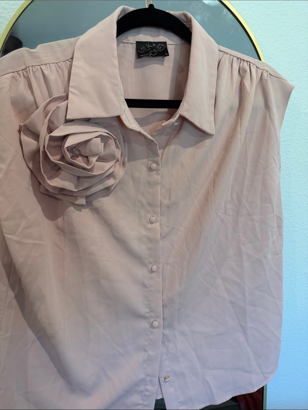 Sleeveless Rosette Button-Front Blouse in Blush Pink by Milk & Honey